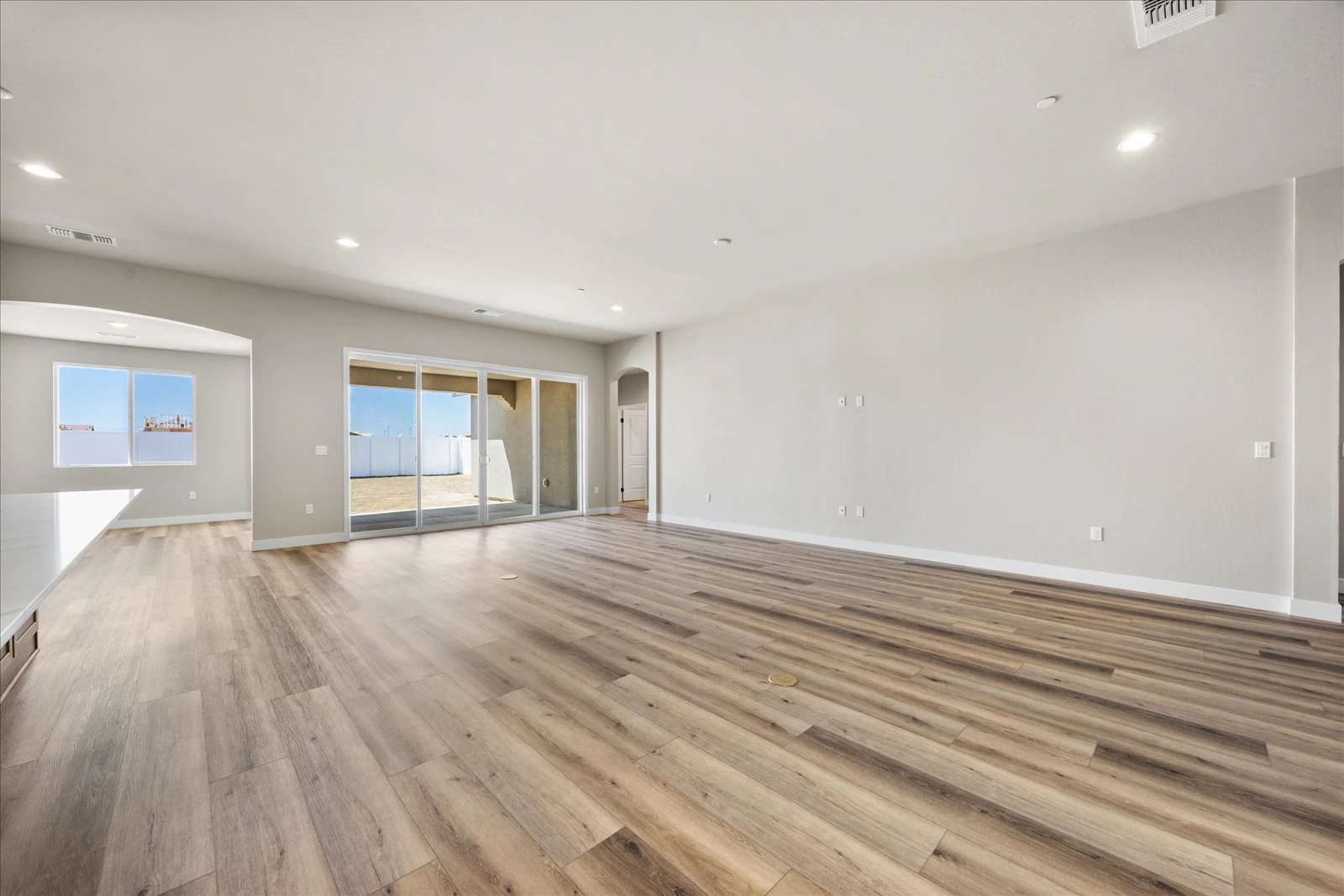 Bright open-concept family room in a Vista Montaire model home